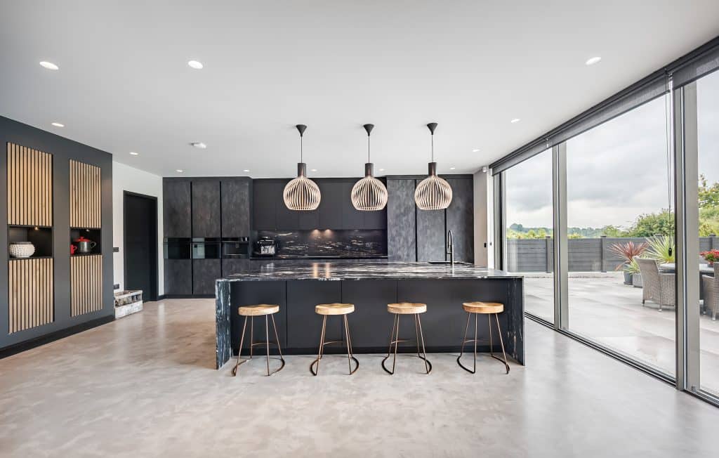 a room filled with furniture and a large window