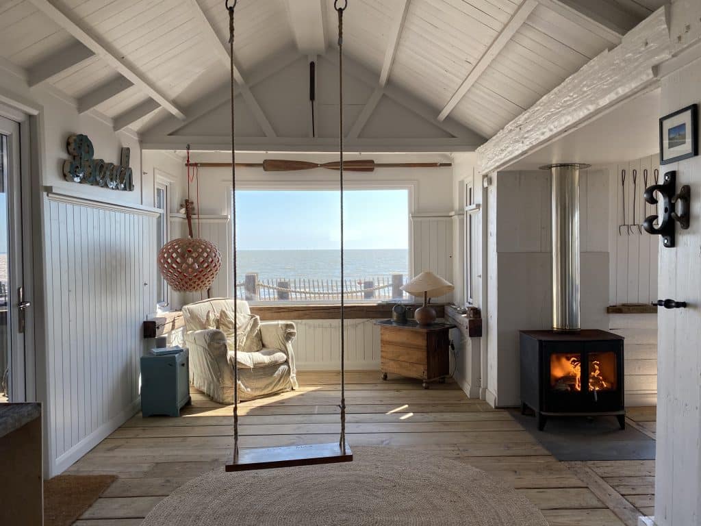 a room filled with furniture and a fireplace