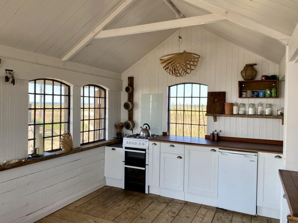 a kitchen with a large window