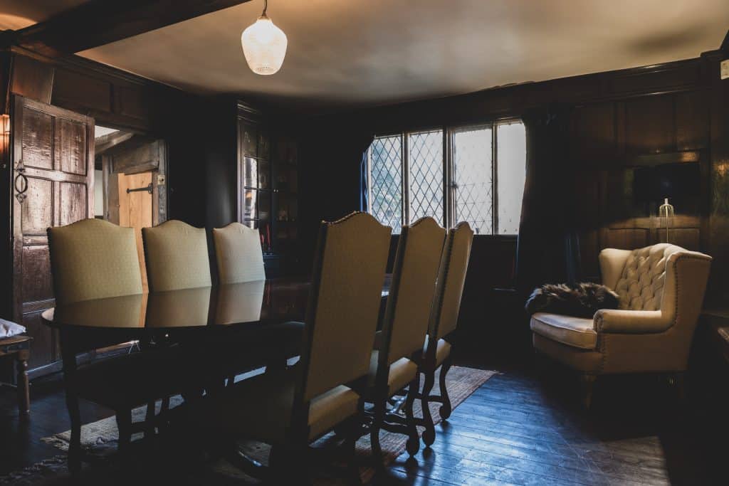 a living room filled with furniture and a large window