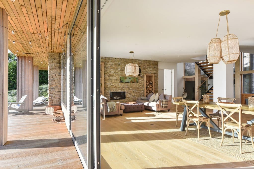 a living room filled with furniture and a fireplace