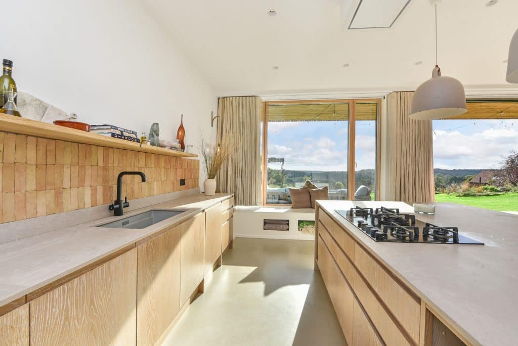 a kitchen with a sink and a window