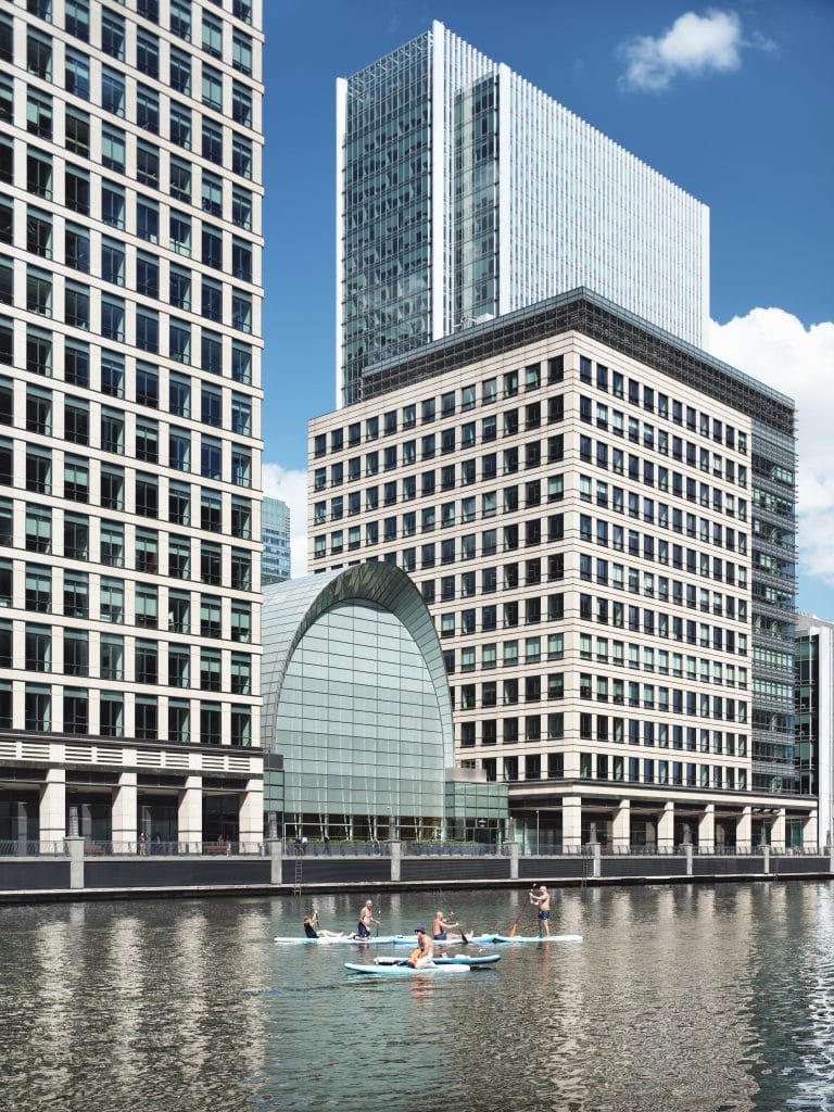 a large skyscraper in the water