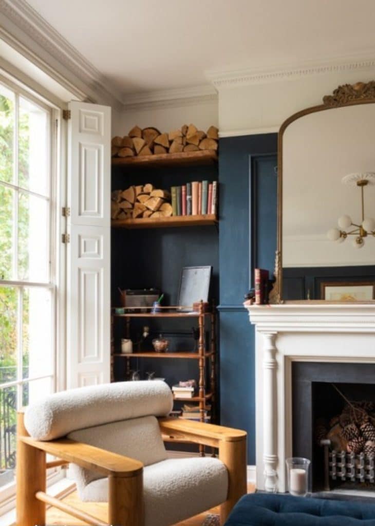 a living room filled with furniture and a fire place