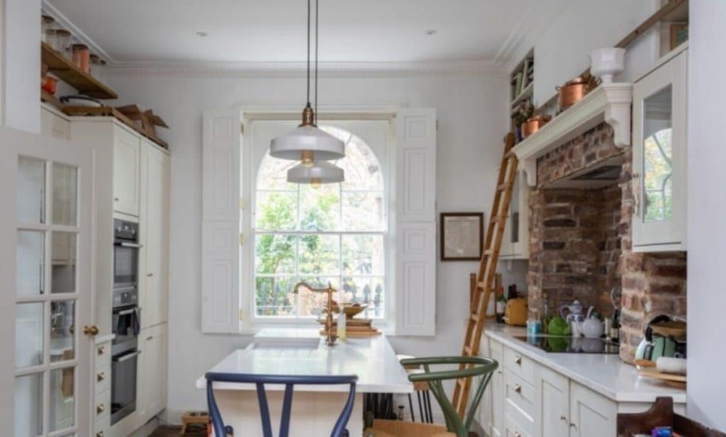 a room filled with furniture and a fire place