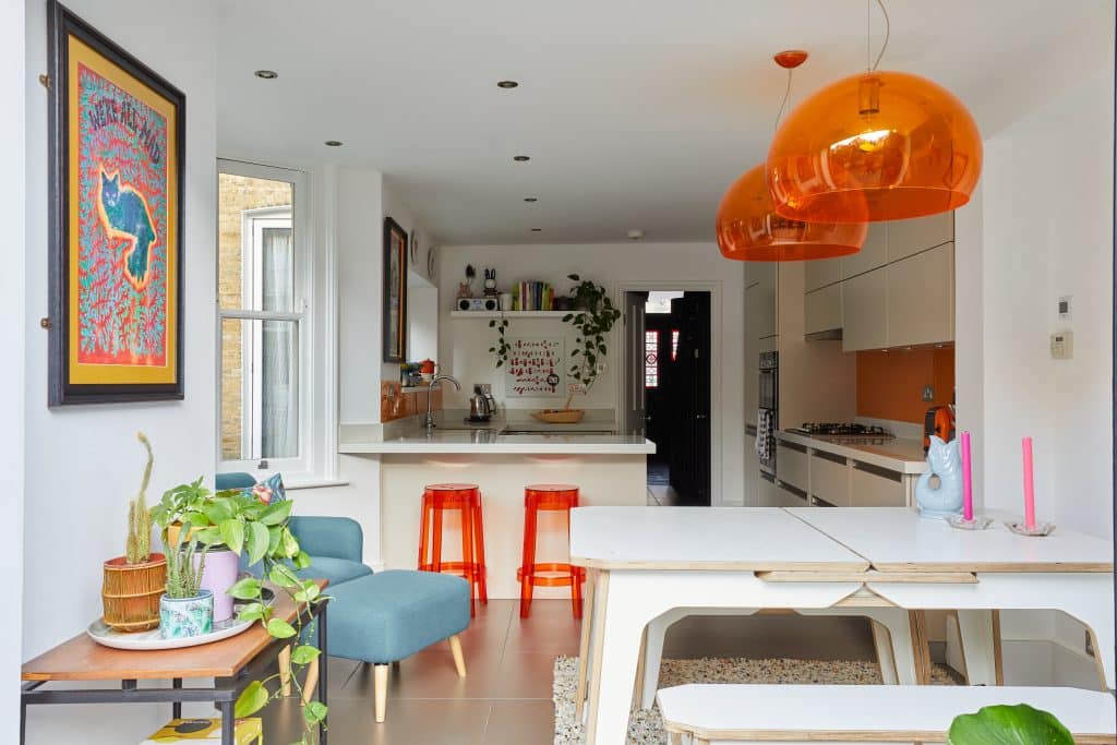 a room filled with furniture and a table