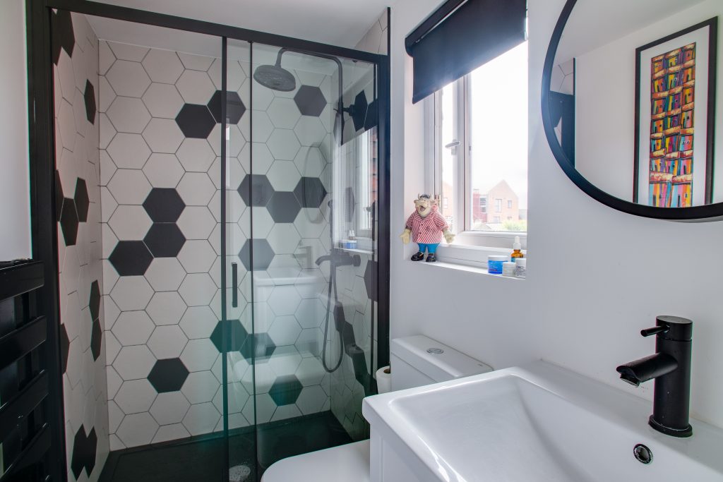 a close up of a sink and a mirror