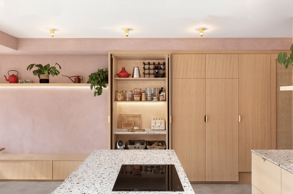 a kitchen with an island in the middle of a room