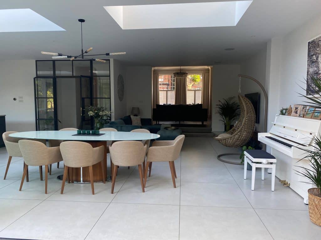 a living room filled with furniture and a table