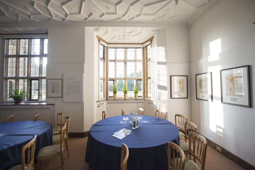 a room filled with furniture and a large window