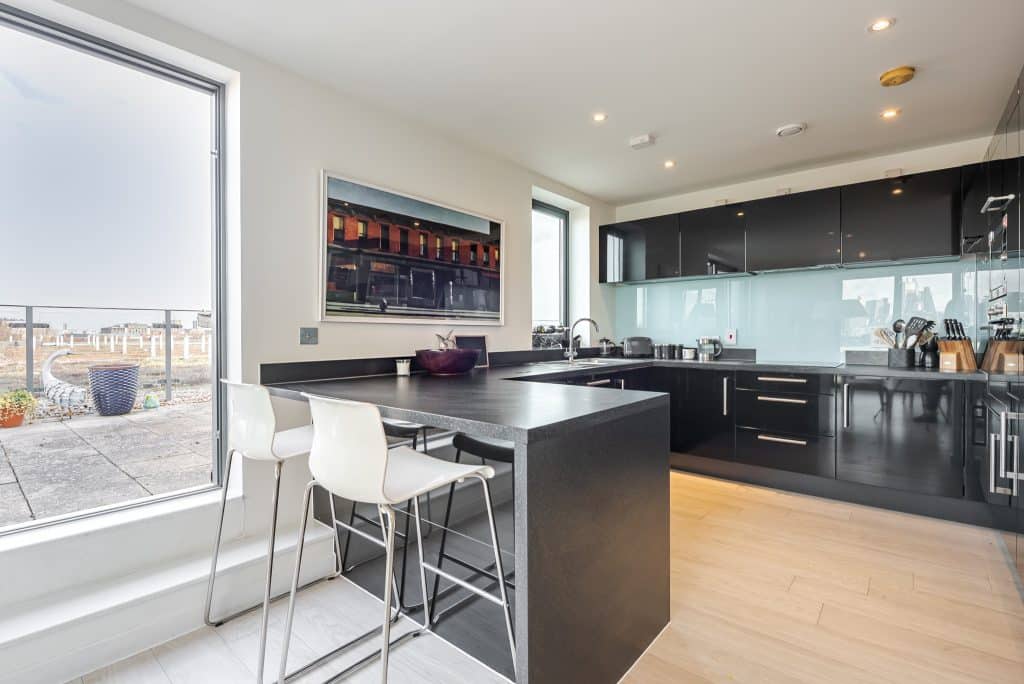 a room filled with furniture and a large window