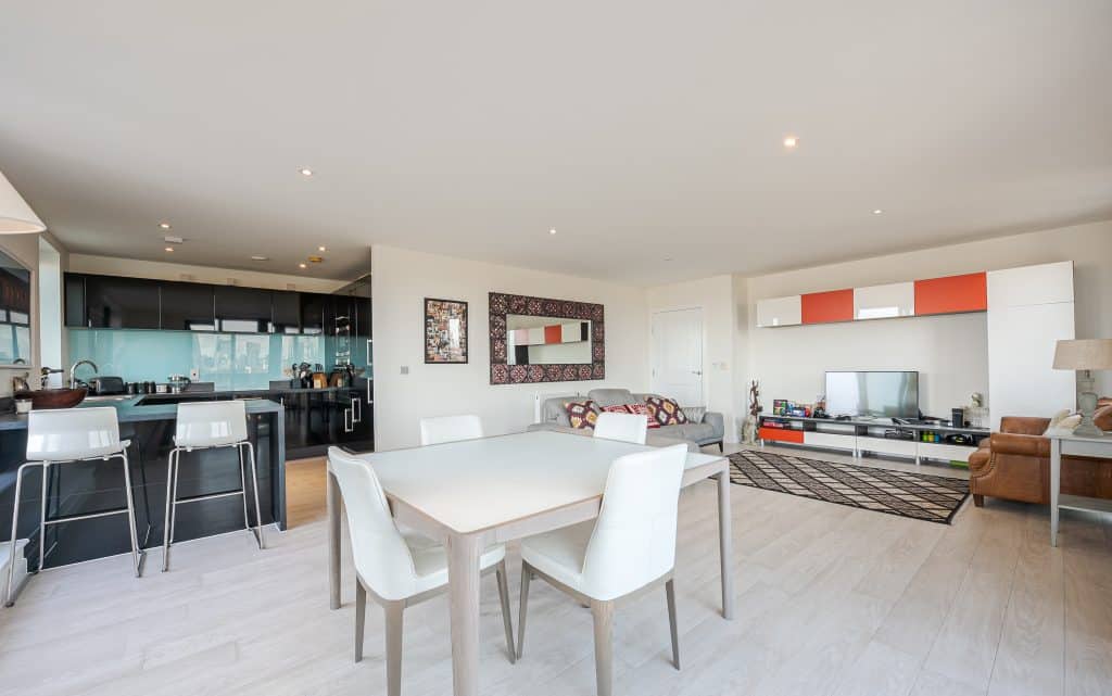 a room filled with furniture and a table