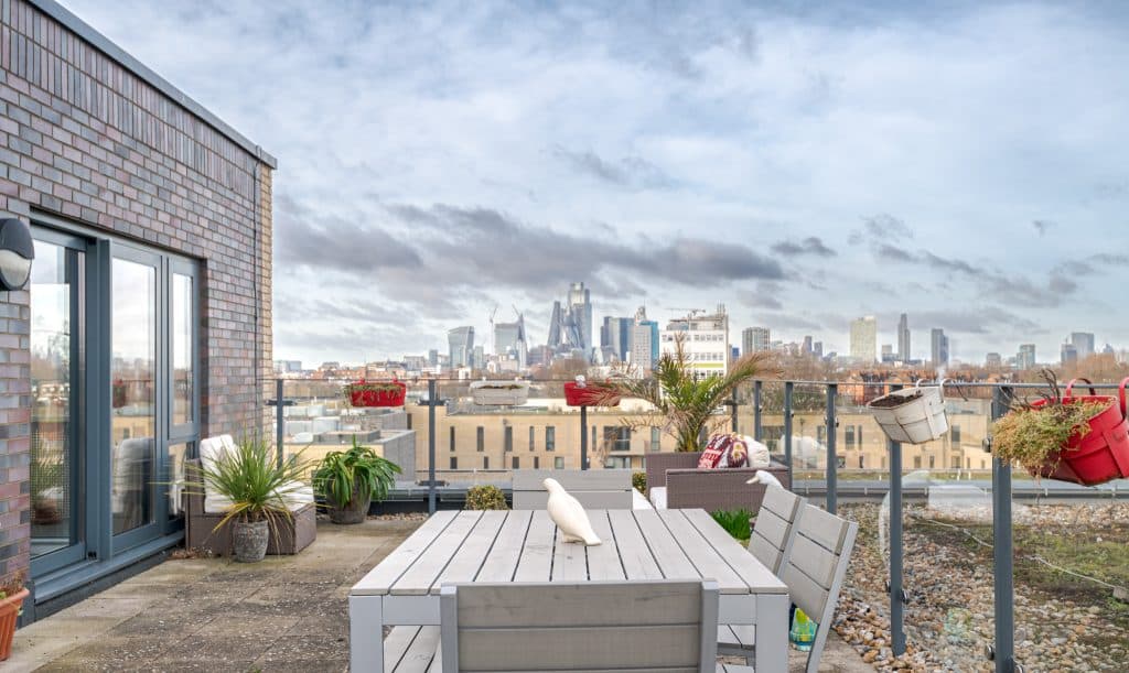 a building next to a fence