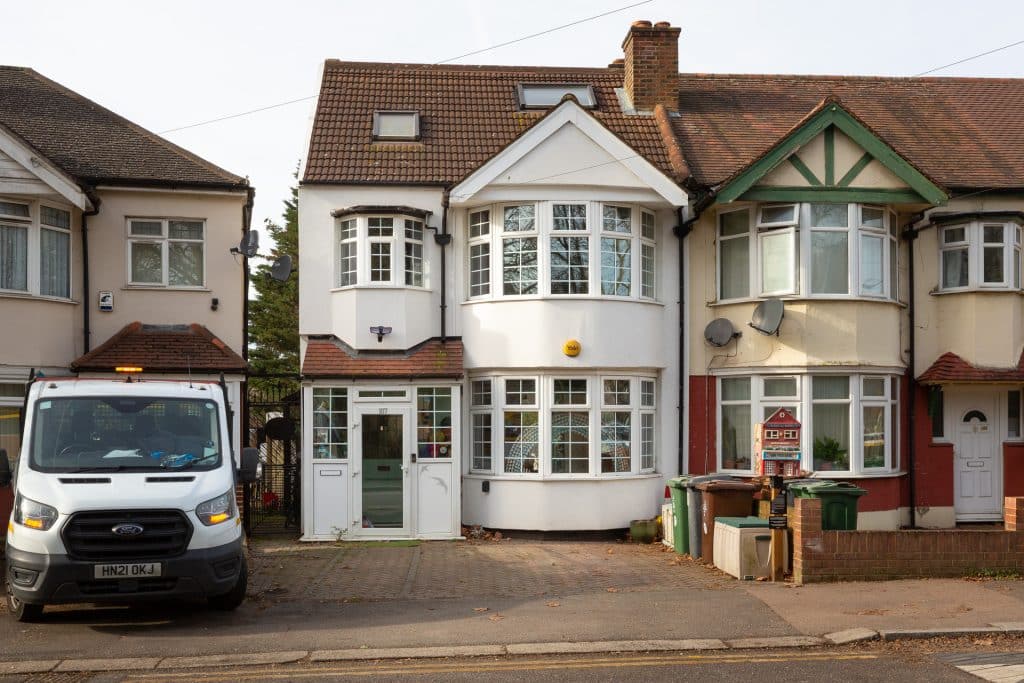 a car parked in front of a house