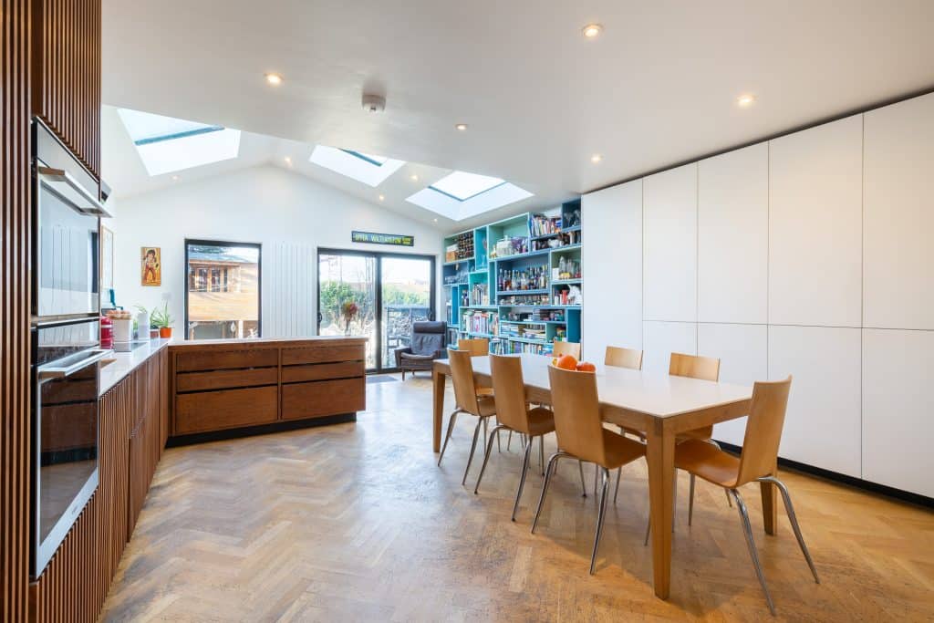 a room filled with furniture and a large window