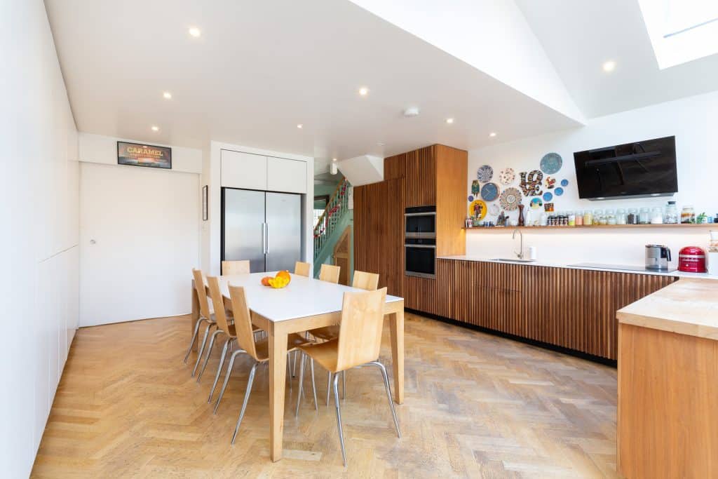 a room filled with furniture and a wood floor
