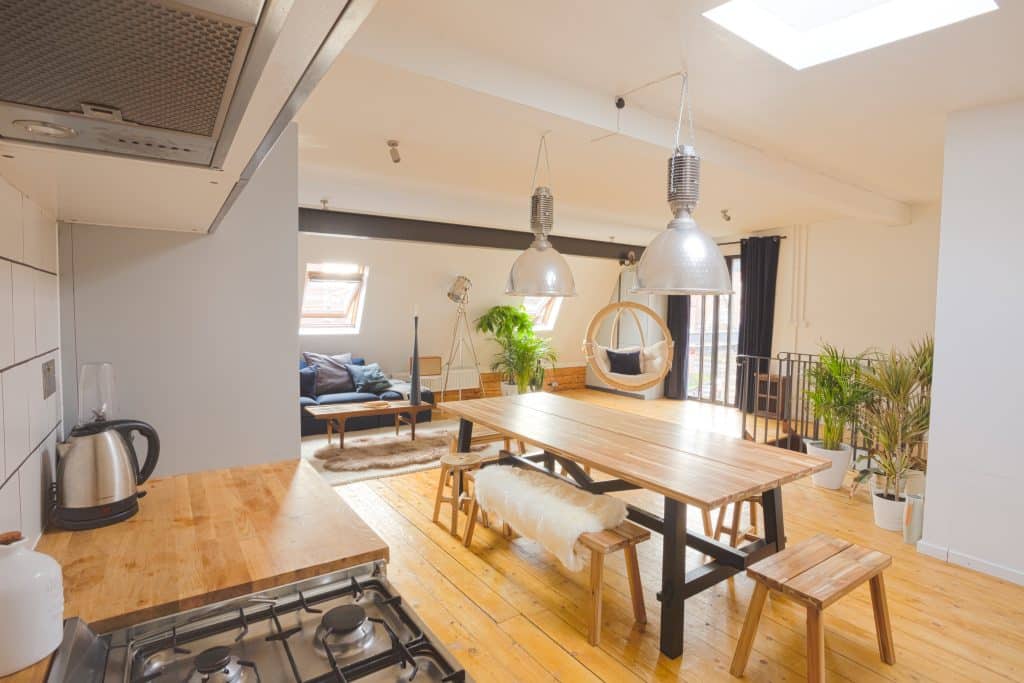 a kitchen with a dining room table