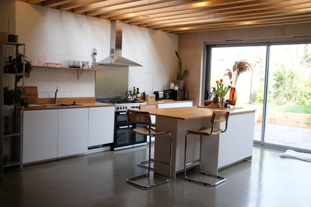 a kitchen with a table in a room