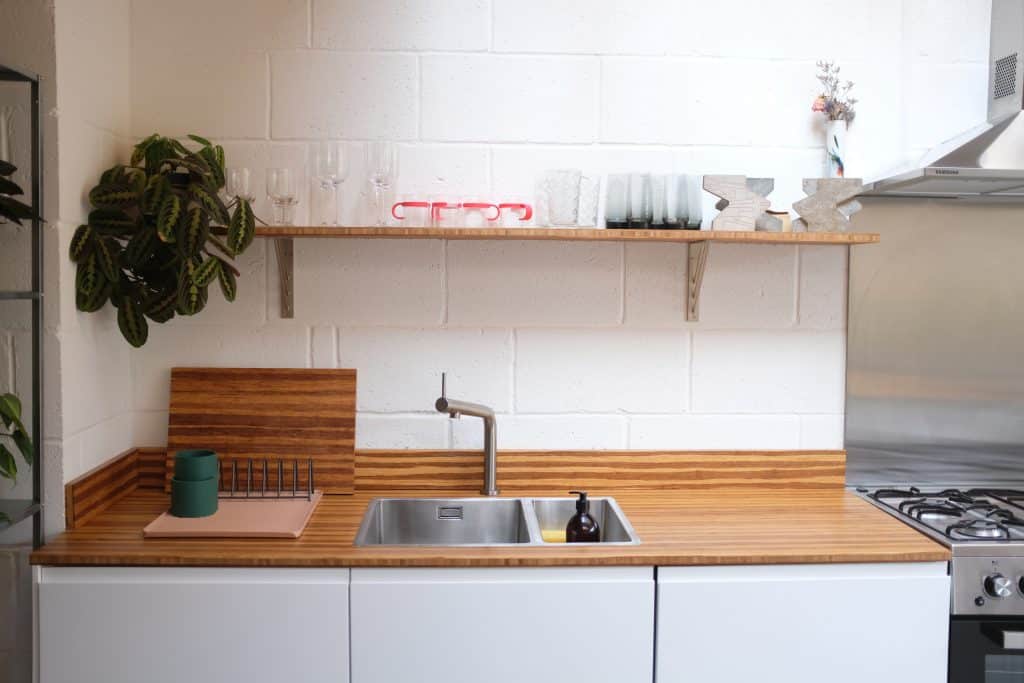 a kitchen with a stove and a sink