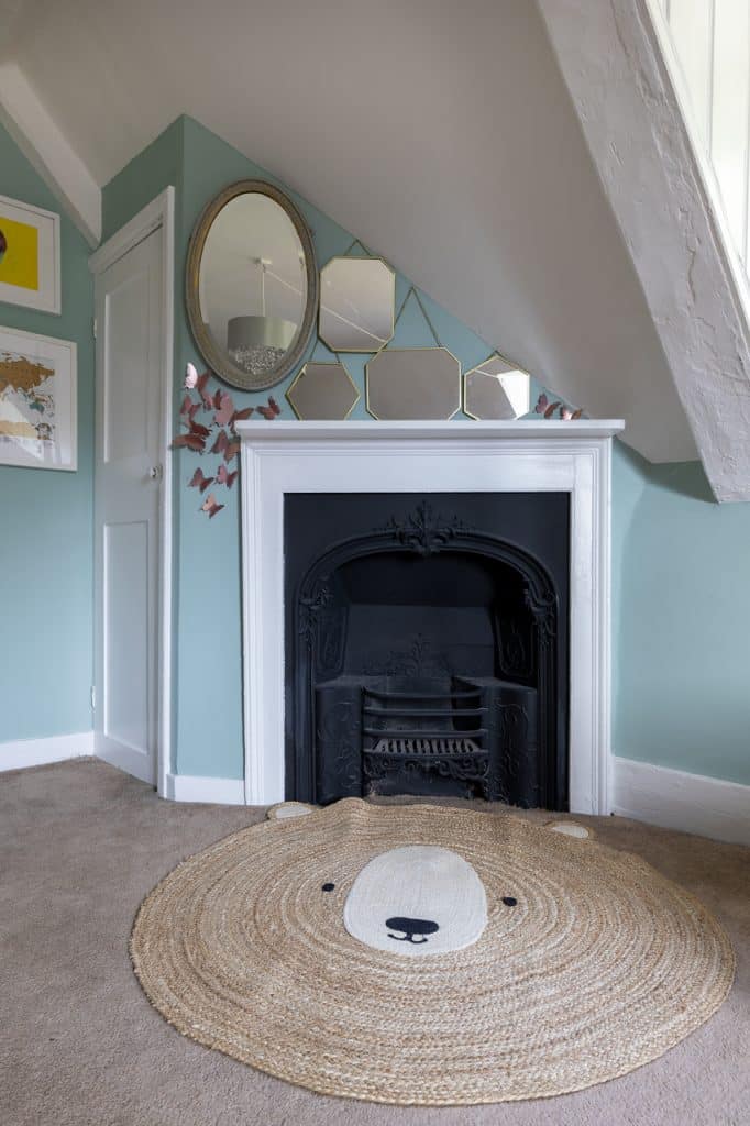 a living room with a fireplace