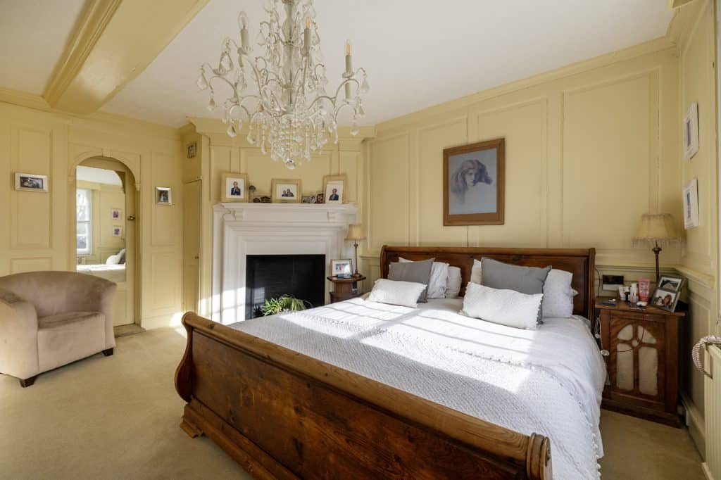 a bedroom with a large bed in a room