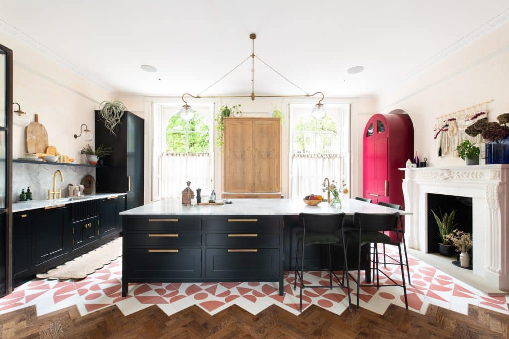 a living room filled with furniture and a fireplace