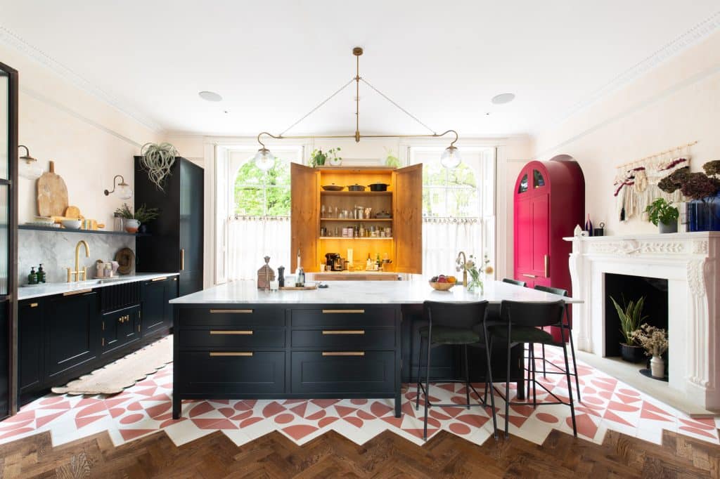 a living room filled with furniture and a fire place