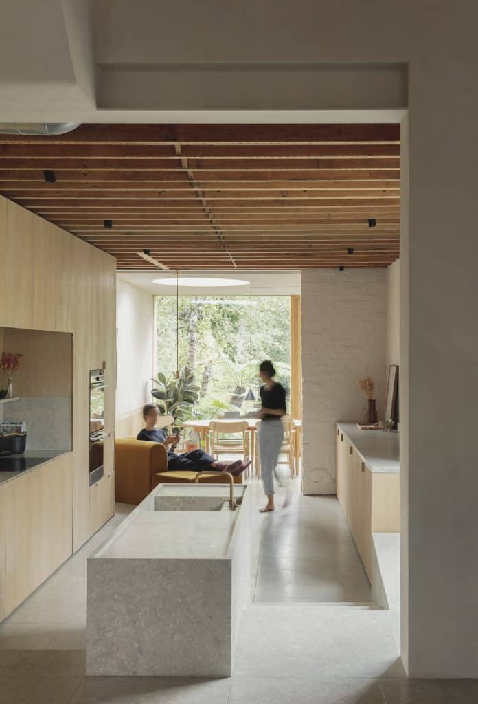 a room filled with furniture and a large window