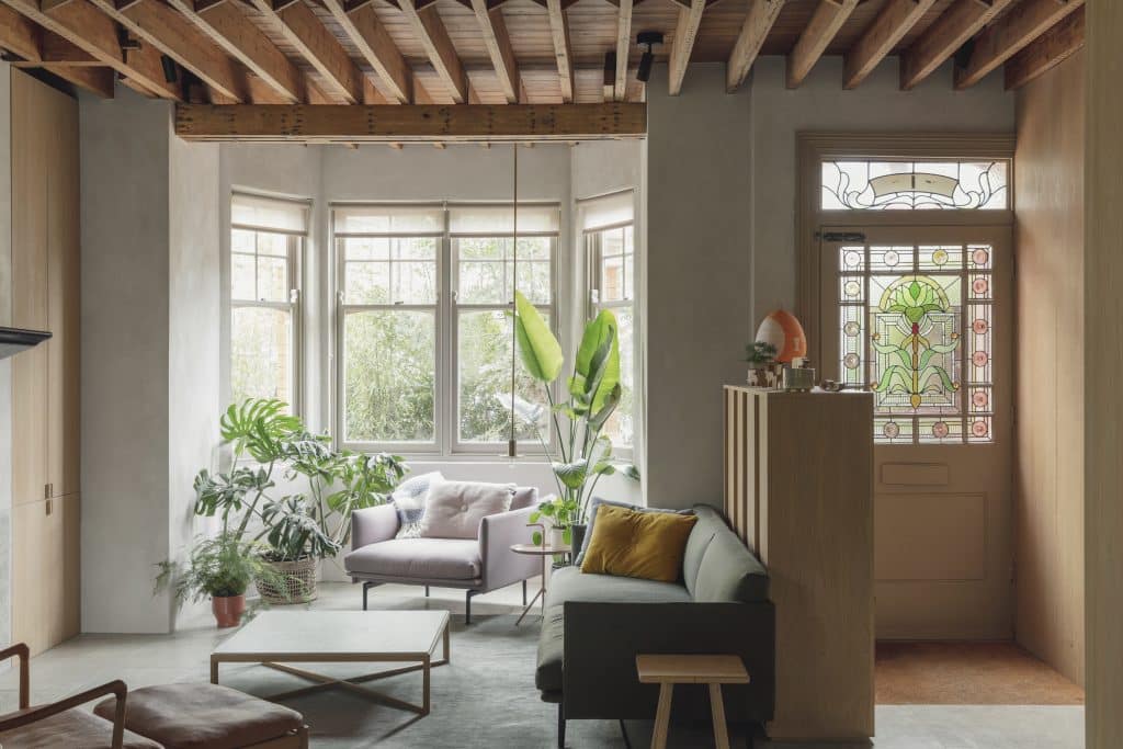 a living room filled with furniture and a fire place