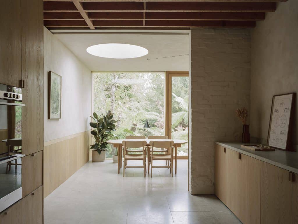 a room filled with furniture and a large window