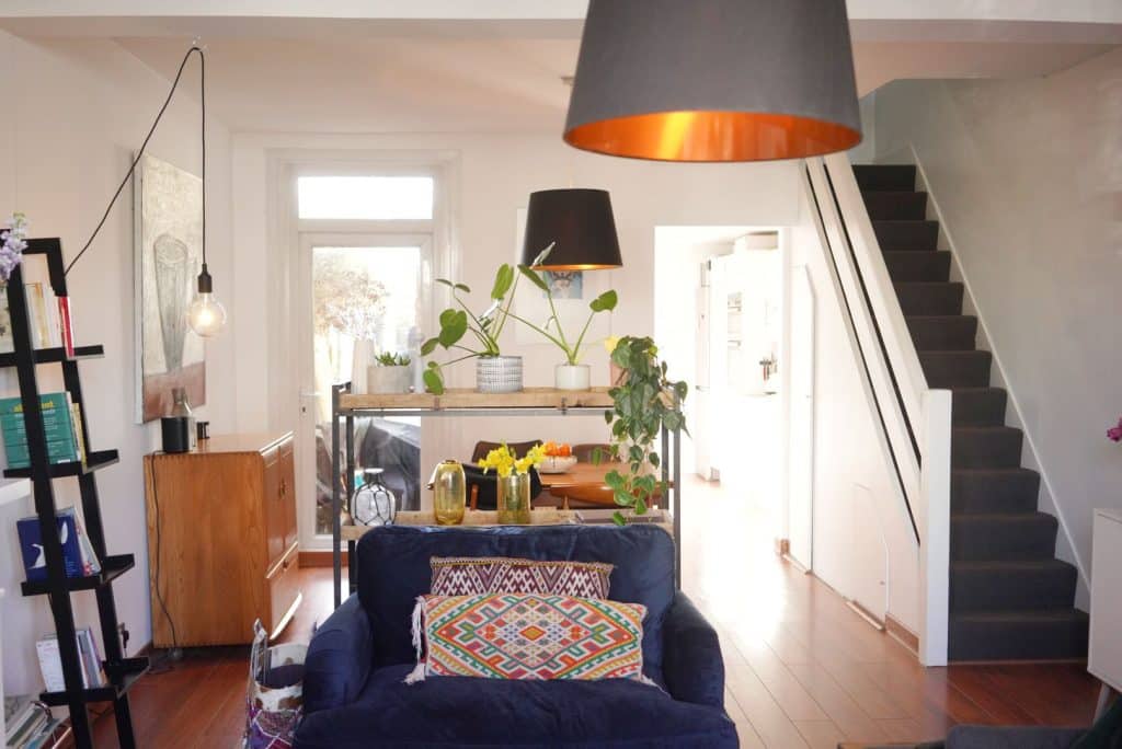 a living room filled with furniture and a fireplace