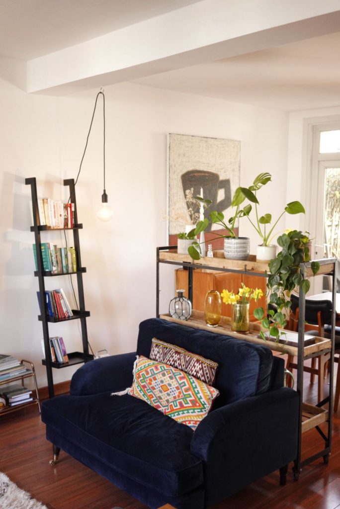 a living room filled with furniture and a fire place
