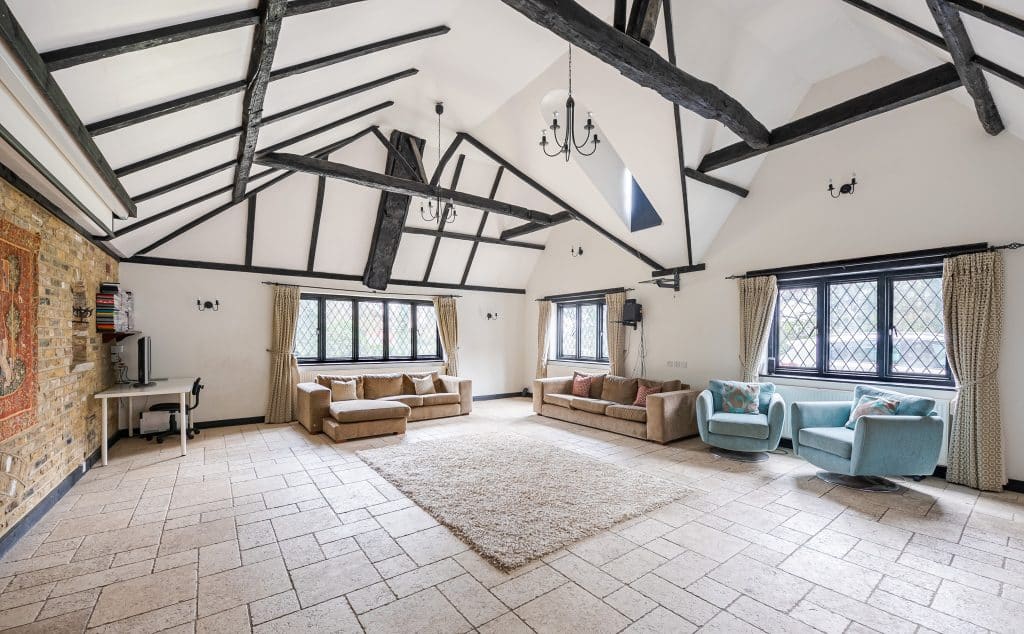 a room with a stone building