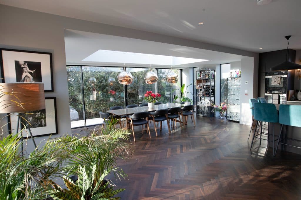 a living room filled with furniture and a table