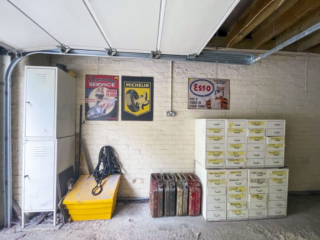 PARK LODGE2. Garage-spacious-storage-stone-wall-posters-TV-filming-location-hire-lodge-London