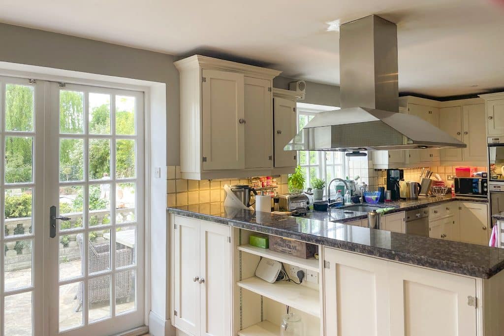 a kitchen with a sink and a window