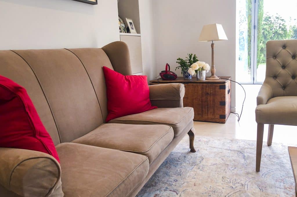 a brown leather couch in a living room