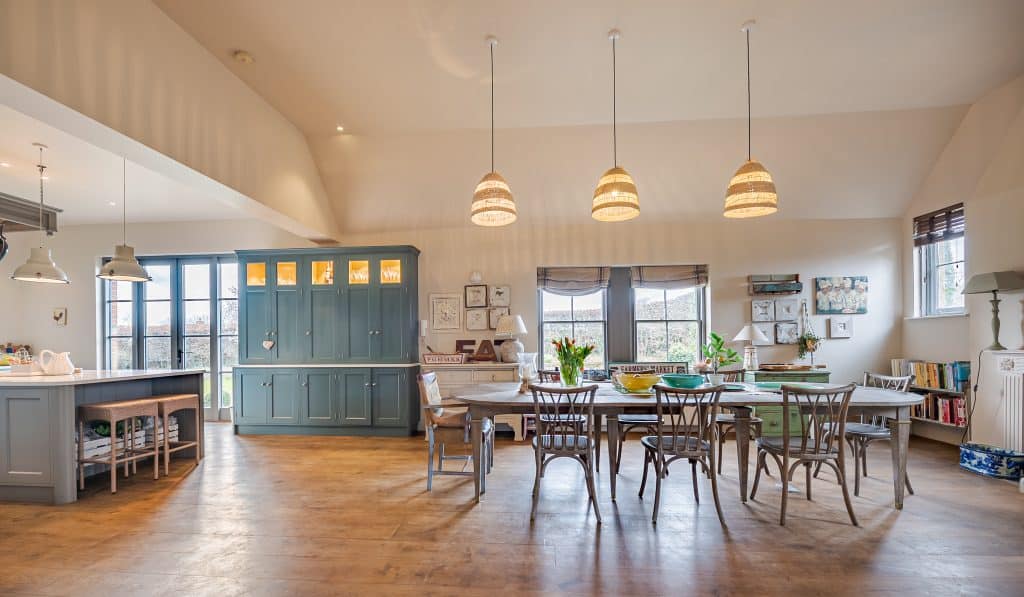 a room filled with furniture and a wood floor