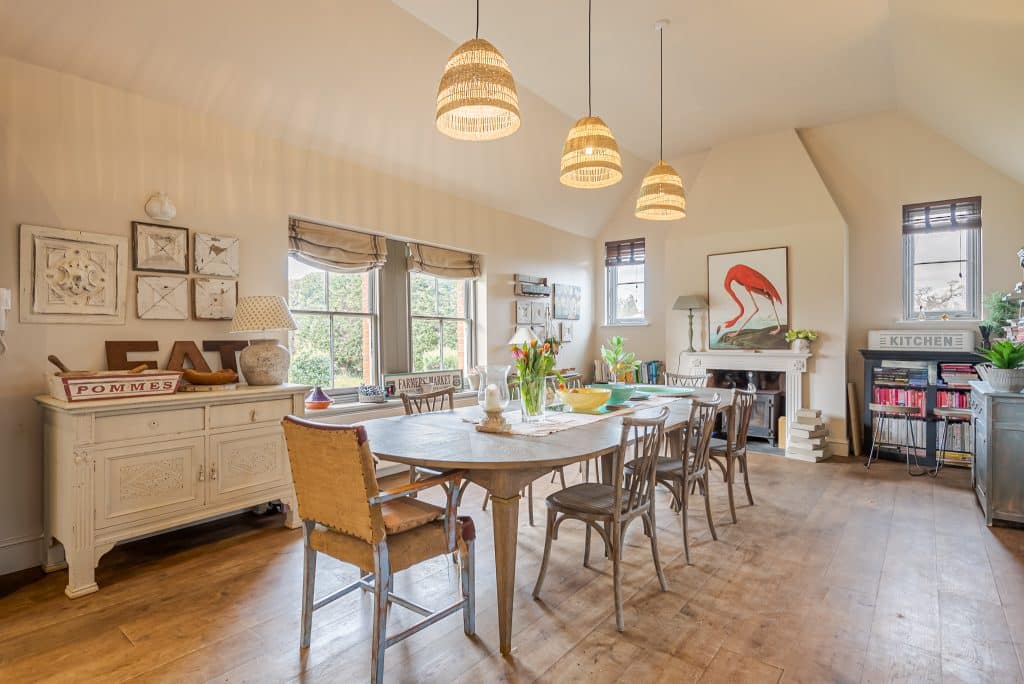 a kitchen with a dining room table