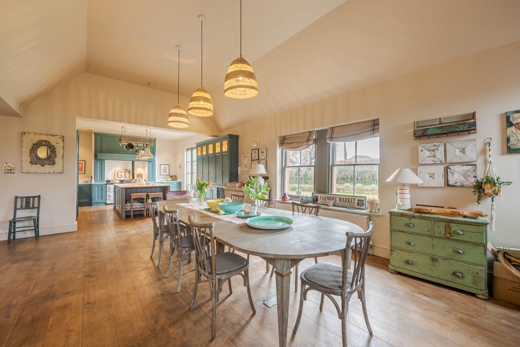 a kitchen with a dining room table