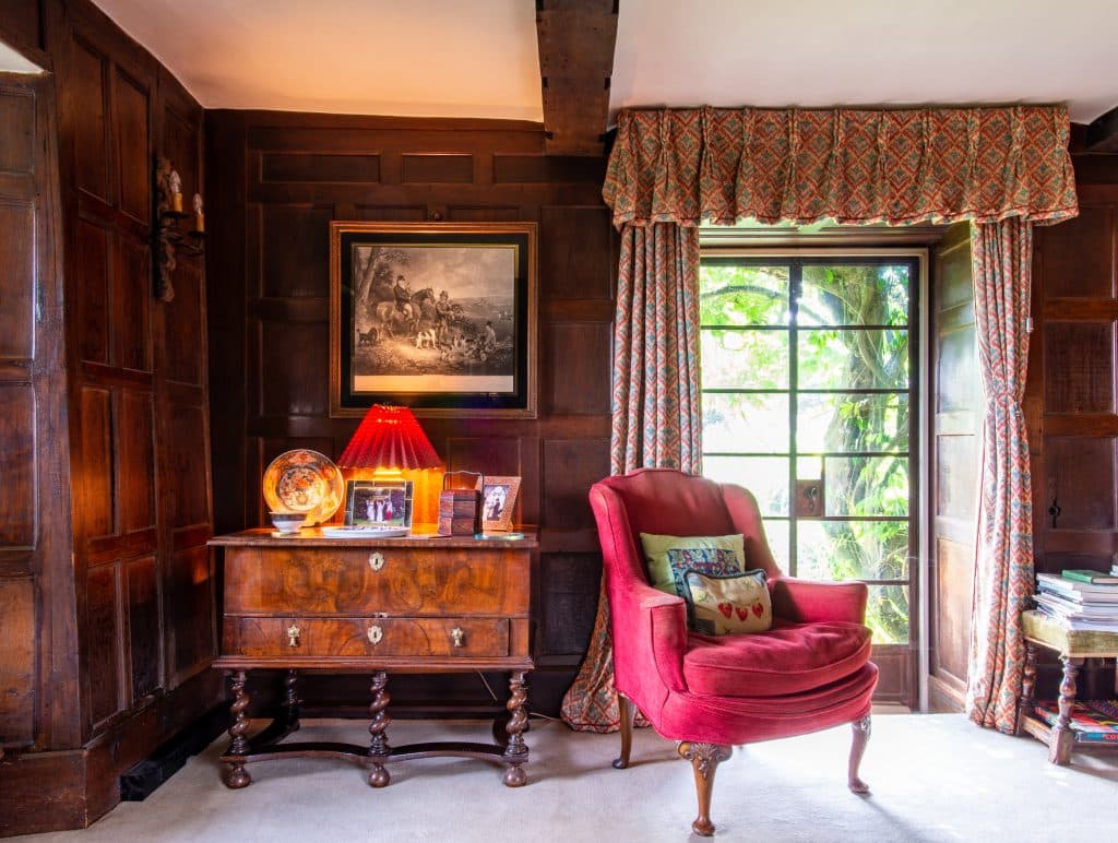 a living room filled with furniture and a fire place