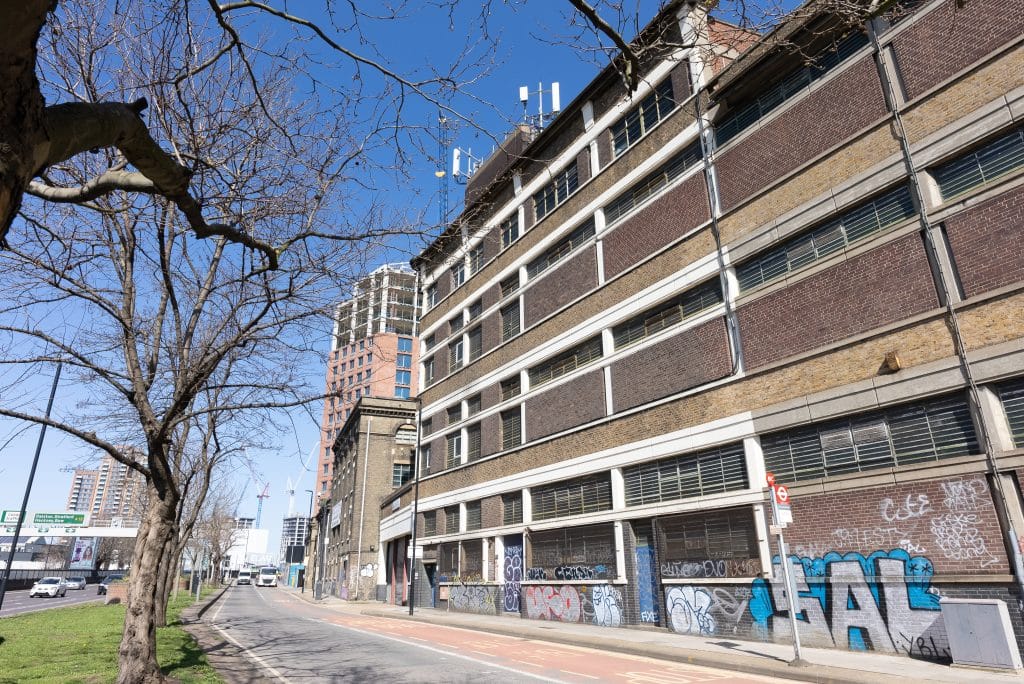 a close up of a street in front of a building