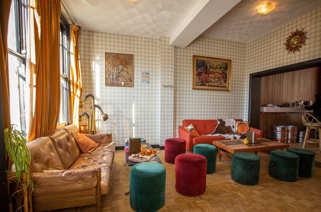 a living room filled with furniture and a fireplace