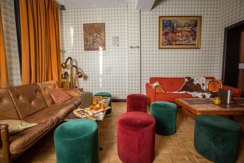 a living room with a couch and a chair