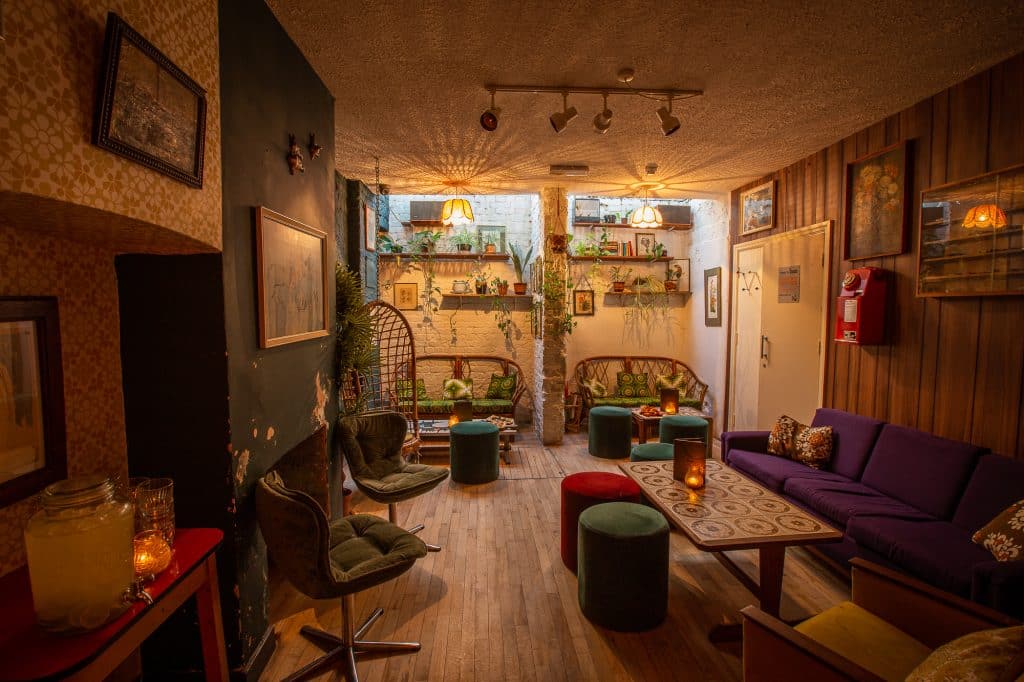 a living room filled with furniture and a fire place