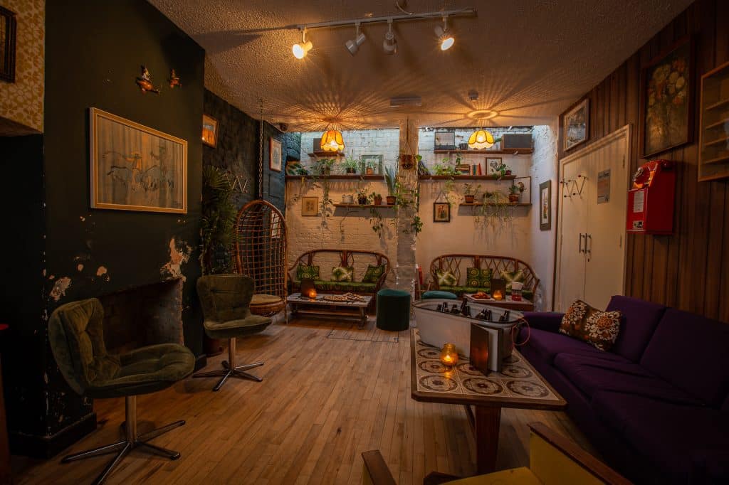 a living room filled with furniture and a fireplace