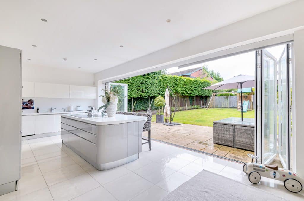 a room filled with furniture and a large window