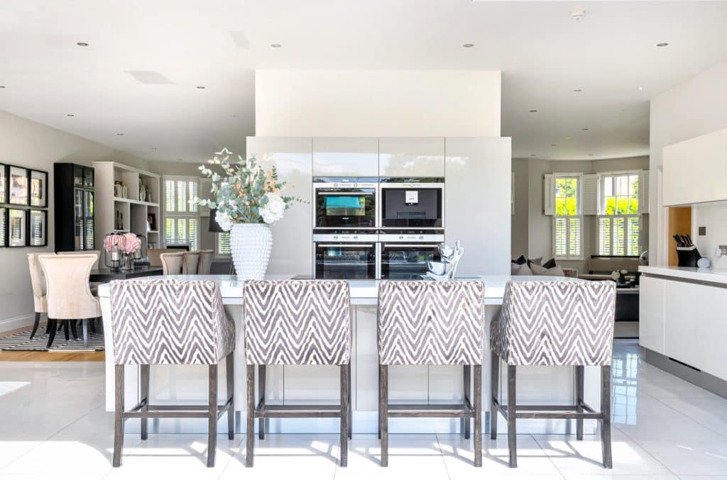 a living room filled with lots of furniture