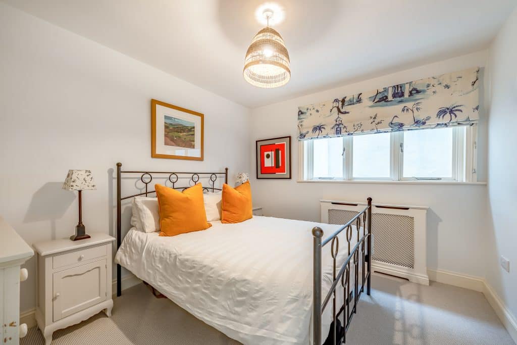 a bedroom with a bed in a hotel room