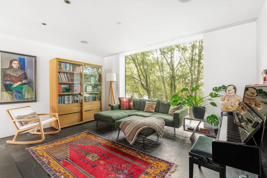 a living room filled with furniture and a fire place